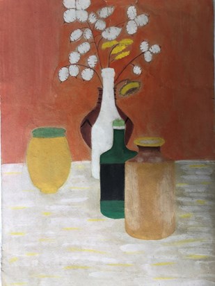 Still life with bottles and dried flowers