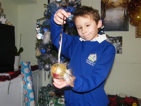 So proud of his Christmas robin! 2008.
