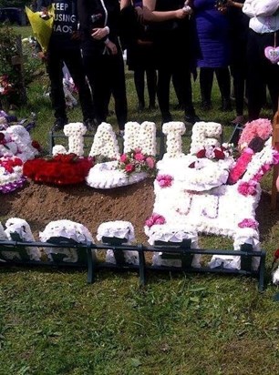 Funeral flowers on Jamie's grave xx