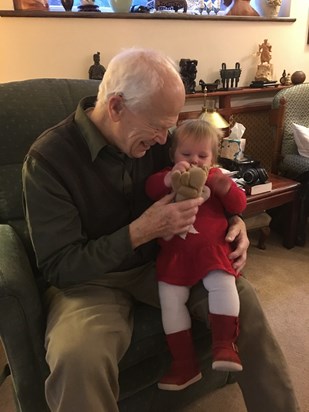 With his youngest grandchild.