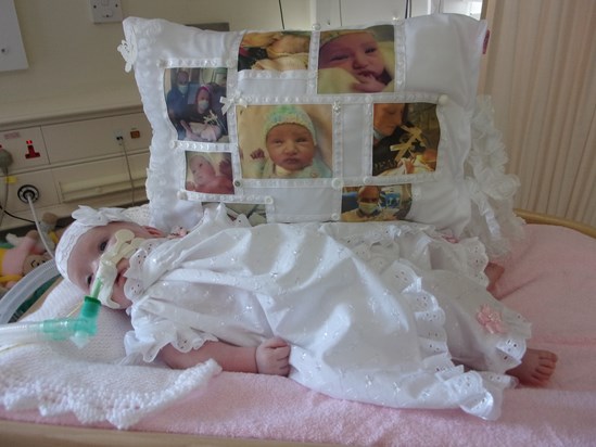 Keira-Mae with her beautiful cushion a special friend made for us. Its one of the only things we have left of you baby girl xxxxxxxx