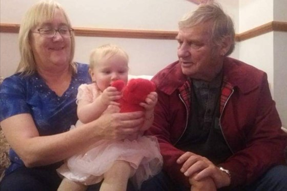 Angela & Roy with Granddaughter Olivia