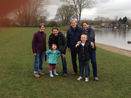 A family walk down the river