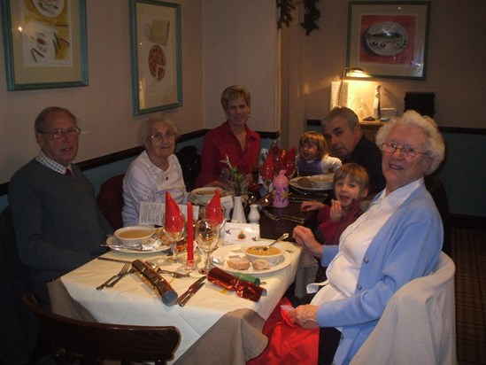 John and family at a Christmas dinner