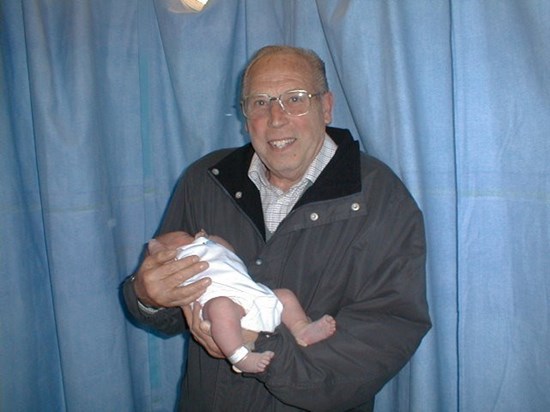 John holding his granddaughter Jess