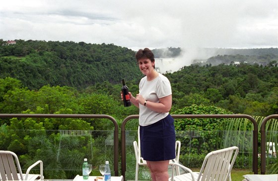 Cracking open the complimentary bottle of wine from the hotel, Iguazú, Argentina, 2001