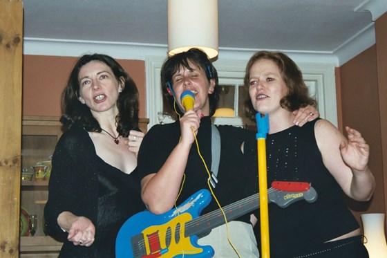 Margaret, Ness and Ali form an impromptu band at a Sinterklaas party at our place in Croydon, 2002.