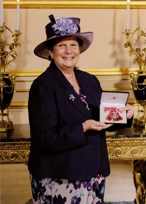 Shirley collecting her MBE in 2013