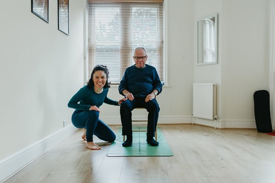 Dad & Charlotte doing 'Chair Yoga' 