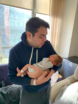 Daniel holding Beautiful Boy, (Jordan).  First grandchild born two days after Steve’s passing.