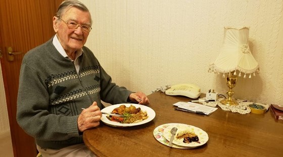 John enjoying Christmas dinner during Covid