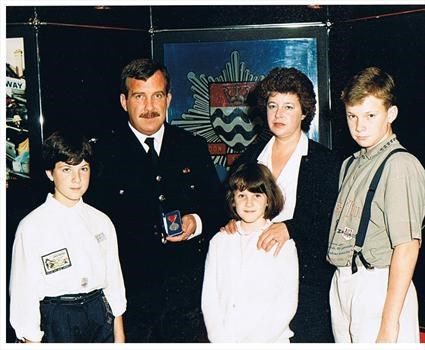 John with Family receiving Medal