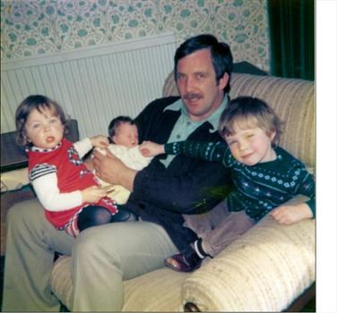 Dad and kids not long after Claire was born (1978). I remember that John dressed Rach this day?!?!!