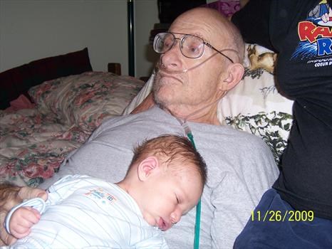 Larry with his newest grandson Chandler Larry