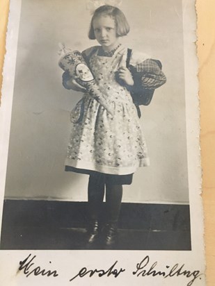 Mum's first day at school, the cone she is holding is called a 'Schultuette', which has all sorts of goodies in it. This is a German tradition on every child's first day at school. 