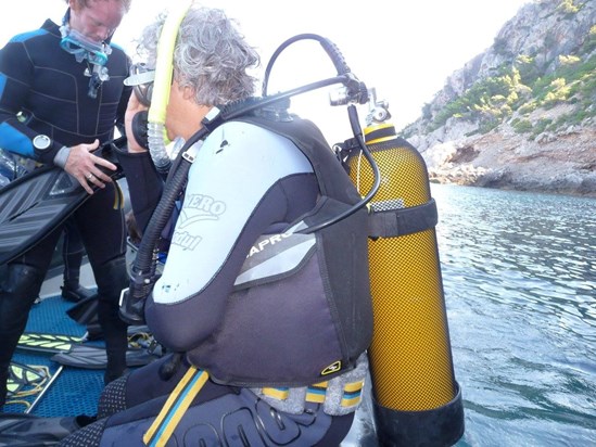 Dad scuba diving in Malta
