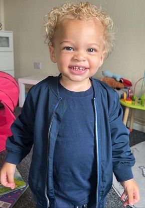 A picture of Theo continues to be happy and smile wide . I know that it would make you 😂.