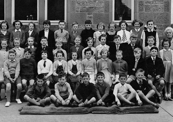 Ellen's school photo. See second back row, second from left. Not sure of year.