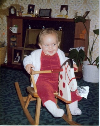 Lucy aged 18months on her rocking horse