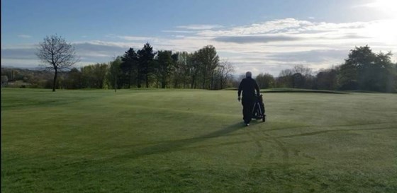 Jack playing golf at Deane