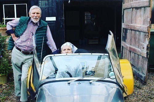 Stuart and his youngest with his beloved Lotus 7