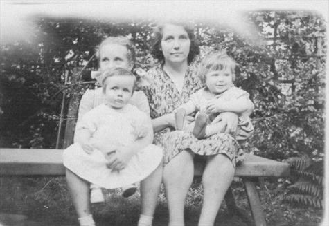 Margaret (top left) with sister Jennifer on her lap and Auntie Rose and cousin Lewis