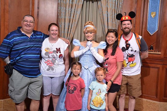 Papa enjoying Disney with Son Ian and Granddaughters Myla and Kaylin
