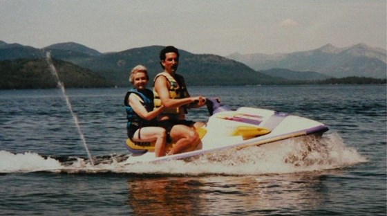 She trusts her son to take her into deep water. Priest Lake, ID, 1996.