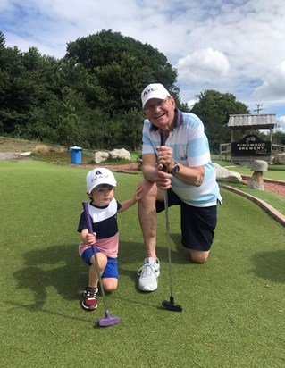 John and his Grandson Porter enjoying Crazy Golf