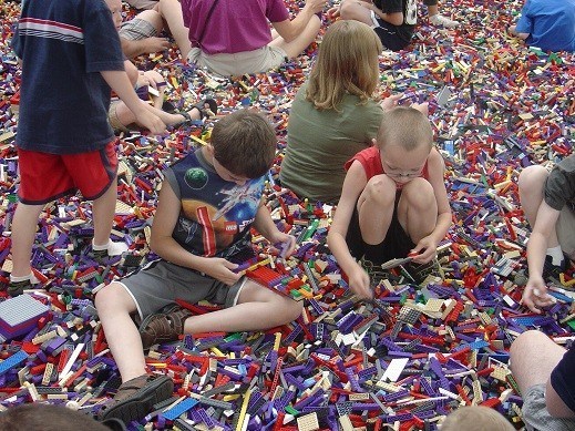 playing in the mountain of legos