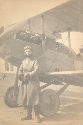 George Henry Palmer Standing besides his plane in the 1st WW