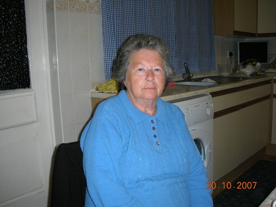 2007 Mum sitting in kitchen Queensway