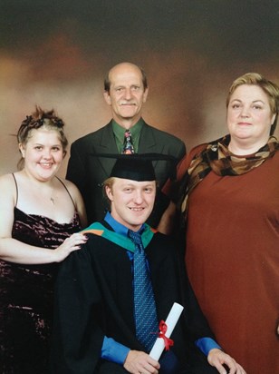 The proud Price's at Rolly's graduation in 1999