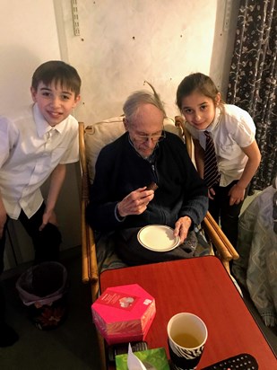 Alan enjoying his birthday cake on his 87th birthday