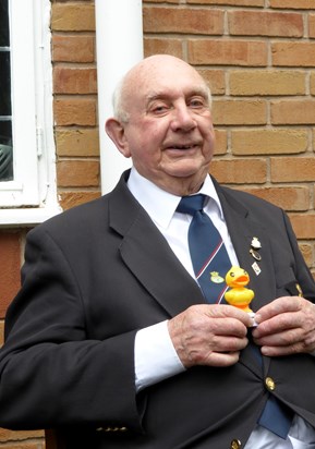 Arthur (Dad) brought this random present for me. A clockwork duck. He was laughing so hard , he could hardly "present" it to me, so I made him pose with it,for the photo,  before he handed it over.