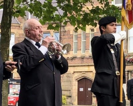 Arthur, playing Last Post in St Helens Town Hall Square 