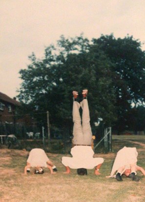 me (Tracey)Jackie and uncle Steve doing headstands haha