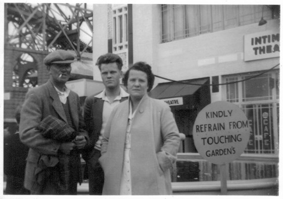Denis with his mother and father  - Frances and Herbert Robinson ... outside Charlie Manning's  Amusement Arcade Felixstowe