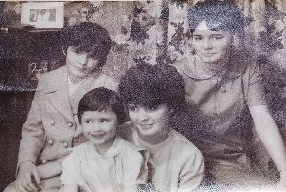 Jennifer with cousin Dolores from Belfast c. 1965-66. Sisters Paddie and Eileen are seated behind.