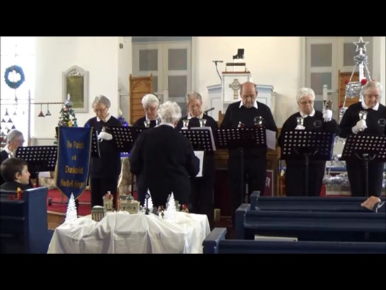 Directing her beloved Handbell Ringers