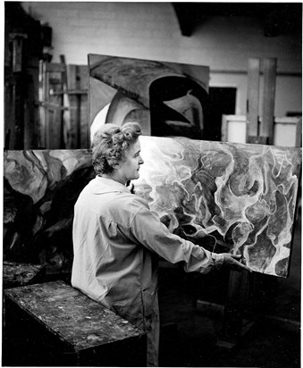 Peg at IIT with her paintings, 1960s