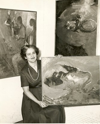 Peg with her paintings 1970s