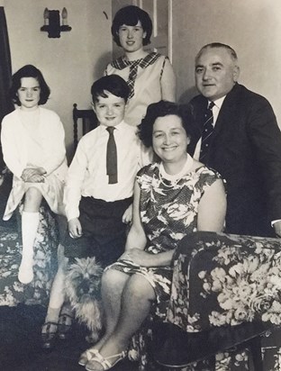 Susan (top) with Anne, John, and parents