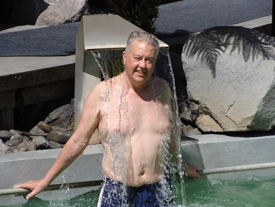 Dad relaxing by the pool in New Zealand this March