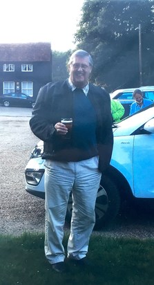 John enjoying a pint.