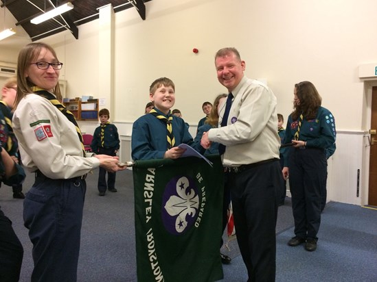 Proud Josh being invested into Scouts