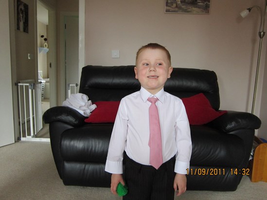 Looking smart for his little sisters christening 2011