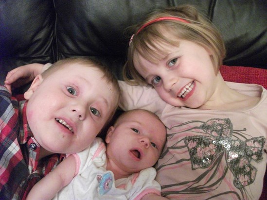Josh with big sis and little sis - Feb 2011