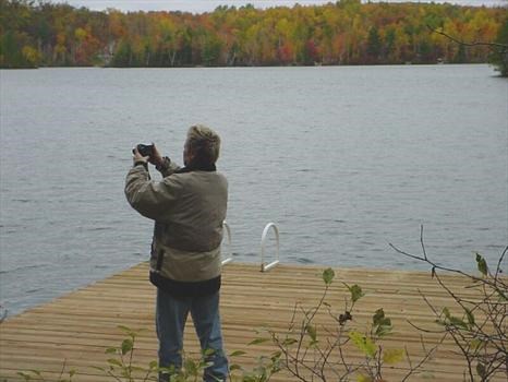 Sid taking a snapshot of Lac Rheaume at the Blythman Cottage (2005) 