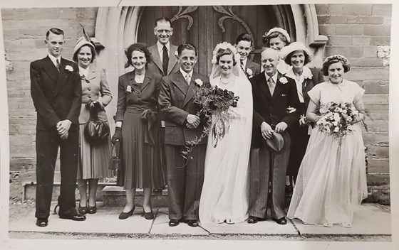 Dad (behind the Bride) at his sister Margaret's wedding 15th July, 1950. Dad was 15.